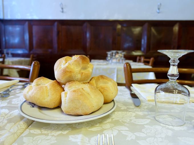 Baguette, European style bread on black wood table in morning time